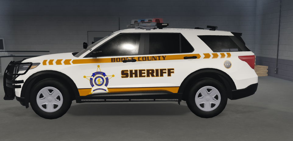Boone County Sheriff SUV with yellow striping and sheriff badge
