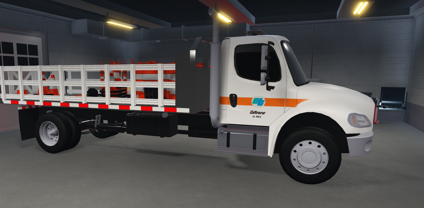 Caltrans maintenance truck with white and orange department colors
