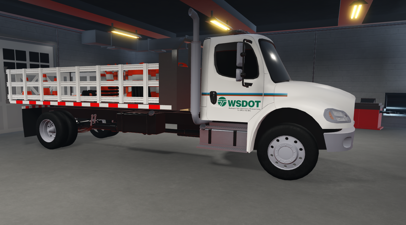 WSDOT maintenance truck with white and blue department colors